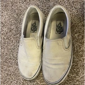 Very used vans slip on shoes.
